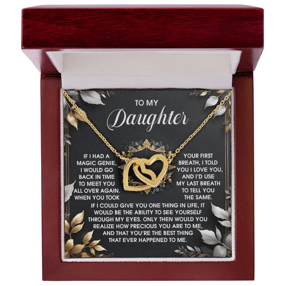 The Daughter-Over Again Interlocking Hearts Necklace, made from surgical steel and featuring cubic zirconia crystals, is beautifully presented in a jewelry box with a heartfelt message for a daughter.