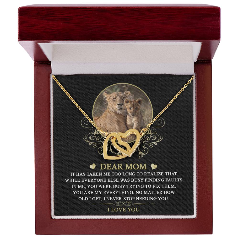 This jewelry box features a lion and cub image and contains the "To Mom, My Everything - Interlocking Hearts Necklace" adorned with cubic zirconia crystals and a heartfelt message for a mother.