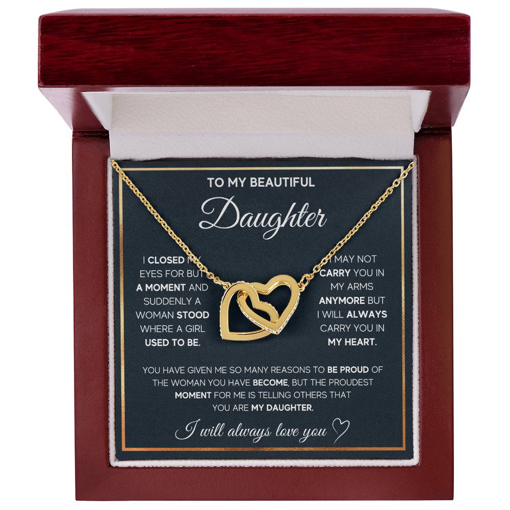 A To My Daughter, I Will Always Carry You In My Heart - Interlocking Hearts Necklace in a gift box with a sentimental message for a daughter, adorned with cubic zirconia crystals by ShineOn Fulfillment.