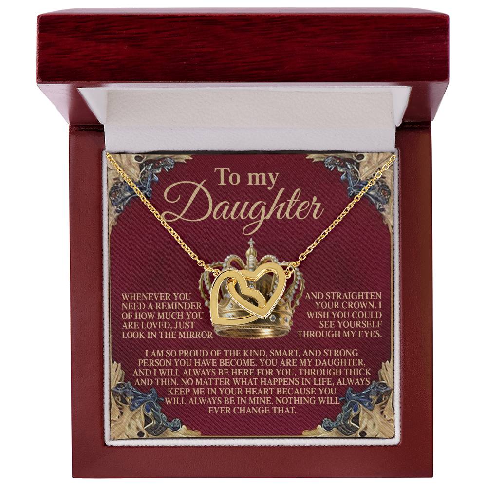 The Daughter-Straighten Crown - Interlocking Hearts Necklace features a rose gold heart and crown pendant with cubic zirconia crystals, in a red box. The card reads, "To my Daughter: I am proud of the kind, smart, and strong person you have become," and includes a heartfelt message of love.