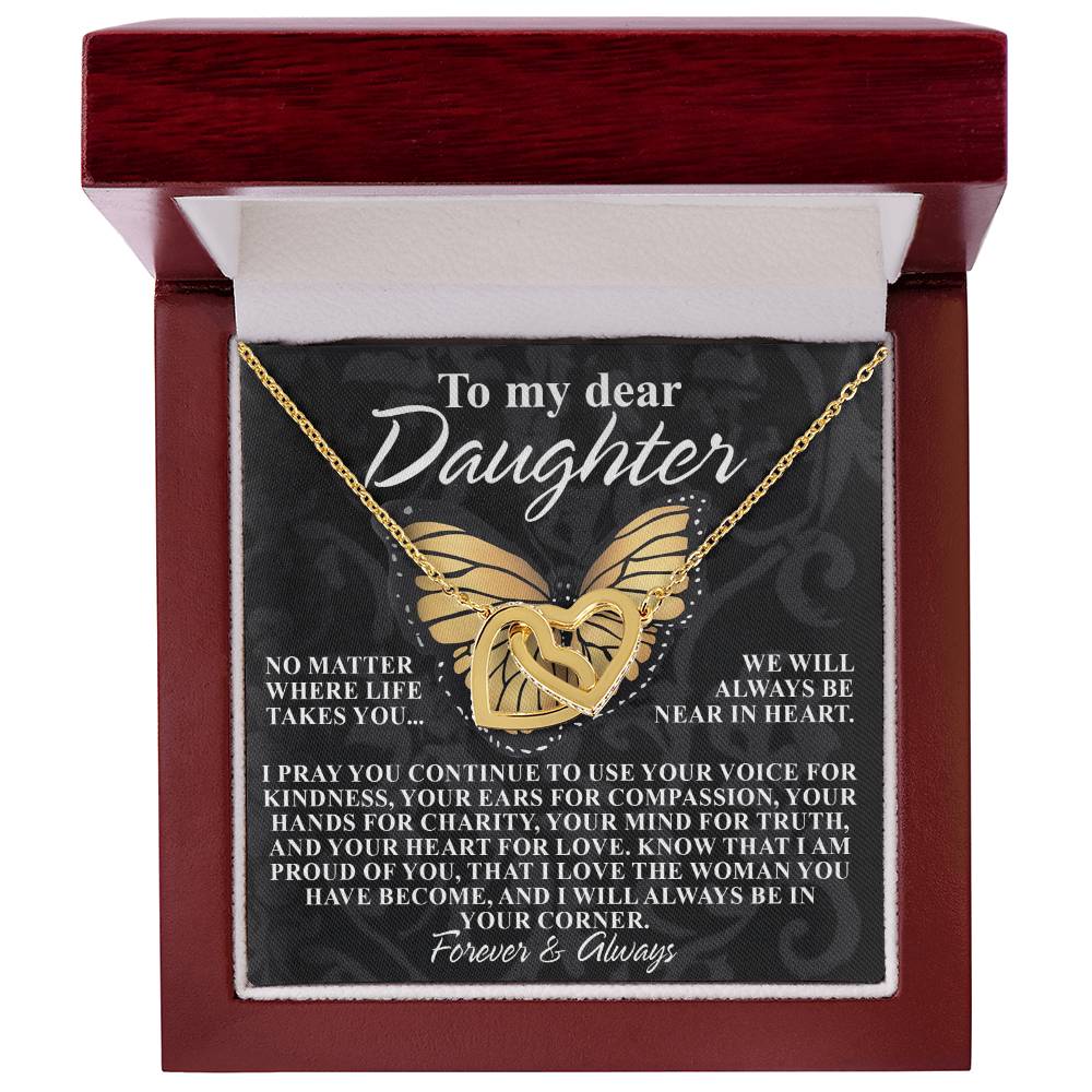 The Daughter-In Your Corner - Interlocking Hearts Necklace is housed in a jewelry box and features a rose gold finish and sparkling cubic zirconia crystals. The message reads: "To my dear Daughter... No matter where life takes you... I will always be in your corner. Forever & Always.