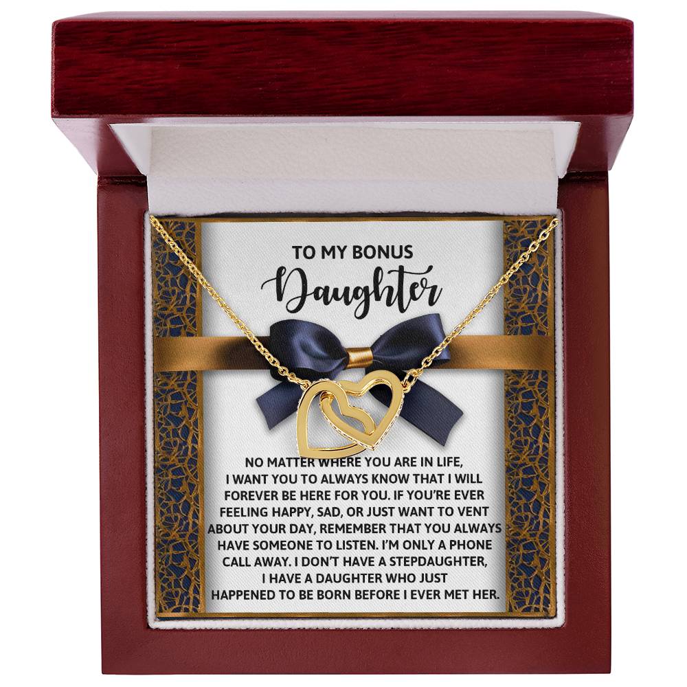 The Daughter-Have Someone Interlocking Hearts Necklace features a rose gold design adorned with cubic zirconia crystals, presented in a gift box. It includes a heartfelt message for a "bonus daughter," expressing unwavering support and love.