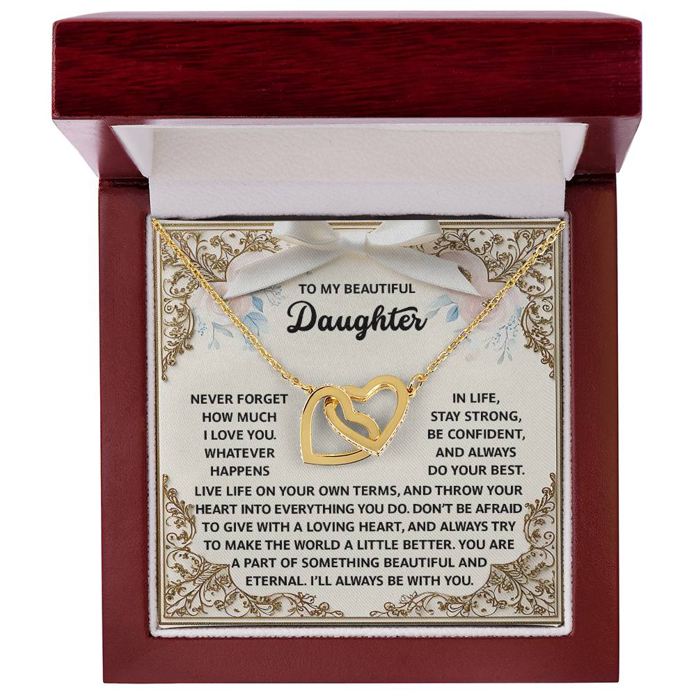 The Daughter-Beautiful And Eternal Interlocking Hearts necklace, with a rose gold finish and shimmering cubic zirconia crystals, arrives in a wooden box with a heartfelt message for your daughter.