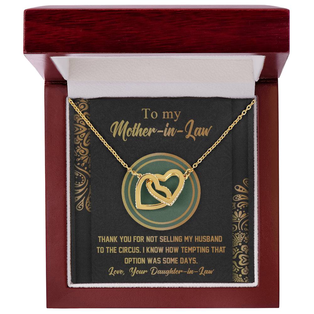 The "To Mother-In-Law, Thank You - Interlocking Hearts Necklace," adorned with cubic zirconia crystals in a red box, features a heartfelt message of love and gratitude from the daughter-in-law: "Thank you for not selling my husband to the circus." A truly unique gift.