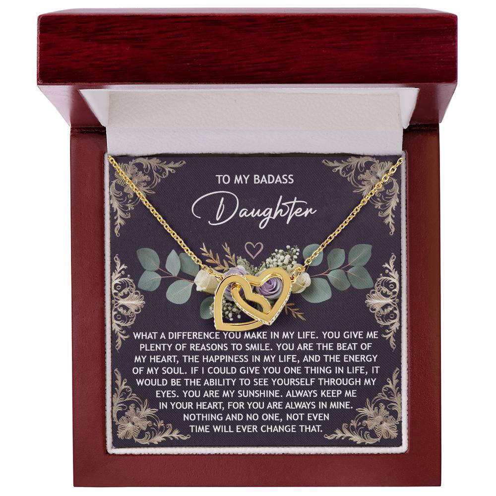 The "Daughter-Always In Mine - Interlocking Hearts Necklace" features cubic zirconia crystals and is presented in a red jewelry box with a heartfelt message for a daughter.