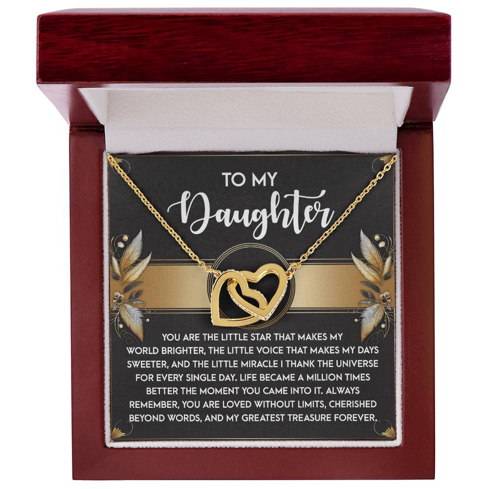 The Daughter-Greatest Treasure Interlocking Hearts Necklace, with cubic zirconia crystals and an inscription, comes in a red box—perfect for your daughter.
