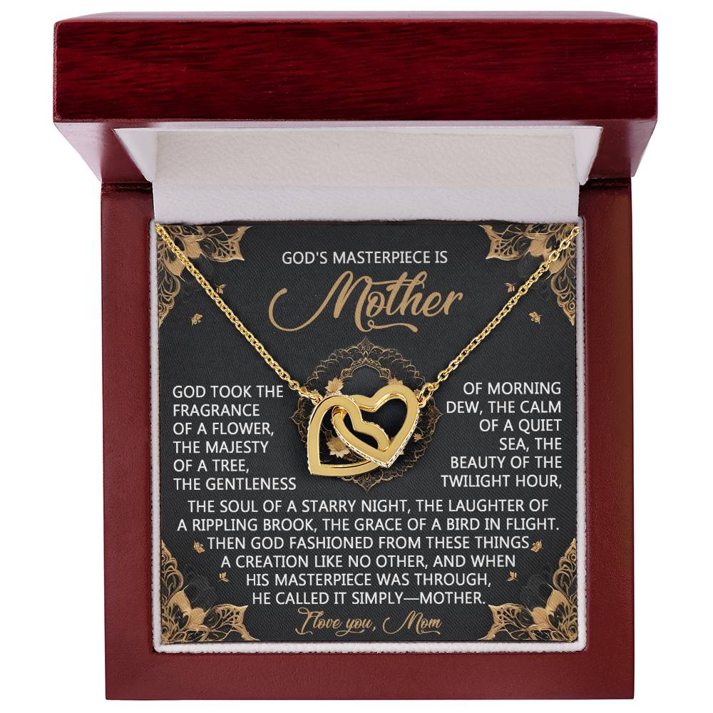 The Mom-God's Masterpiece - Interlocking Hearts Necklace, with a rose gold finish, comes in a red box and includes a decorative card that says "God's masterpiece is Mother," featuring a heartfelt poem celebrating mothers' invaluable role.