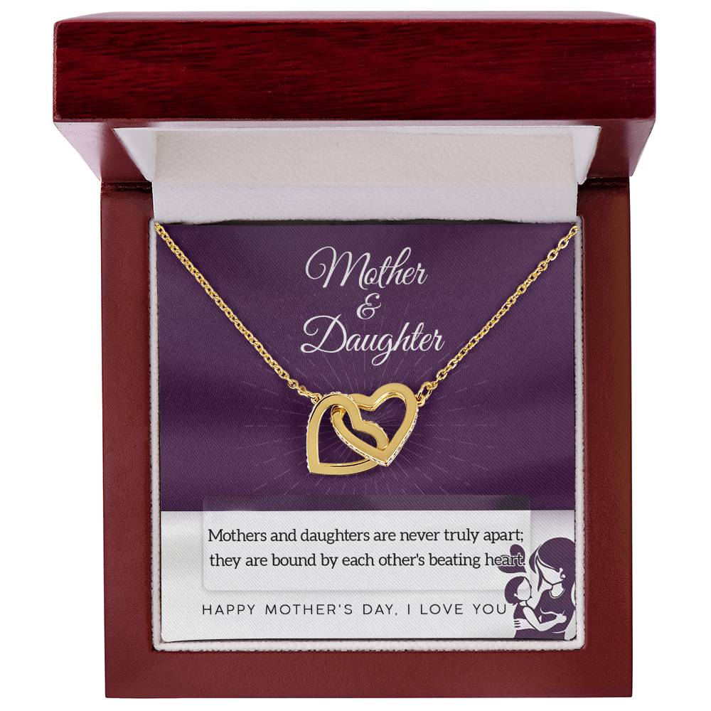 The Mother & Daughter-Never Truly Apart Interlocking Hearts Necklace features cubic zirconia crystals in surgical steel and rose gold finish. Presented in a wooden box, it celebrates your loving bond this Mother’s Day.