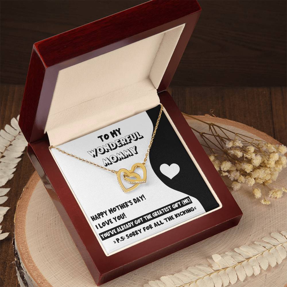 A heart-shaped pendant necklace with a Mother's Day message displayed in a gift box transforms into a "To Mom To Be, The Greatest Gift - Interlocking Hearts Necklace" for a glamorous anniversary gift from ShineOn Fulfillment.