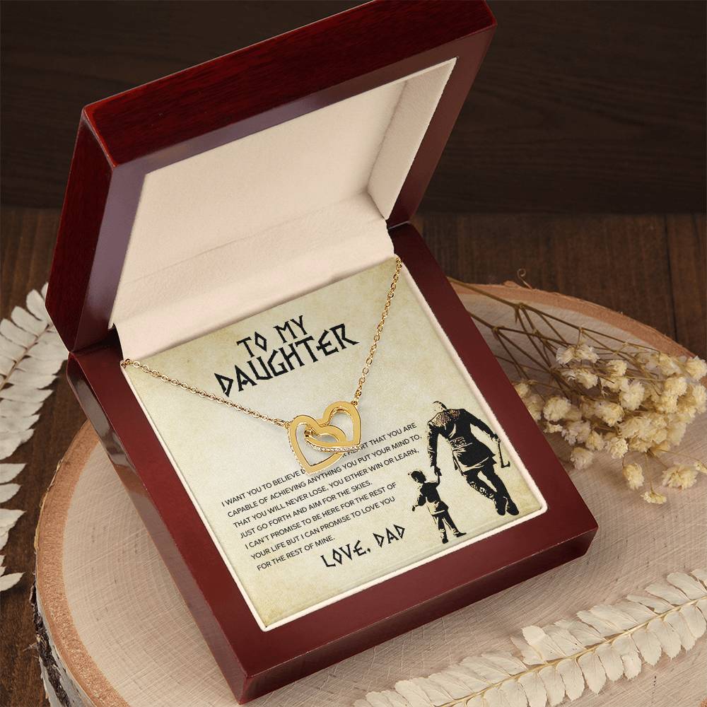 A heart-shaped pendant necklace, known as the "To My Daughter, You Will Never Lose - Interlocking Hearts Necklace" from ShineOn Fulfillment, in a box with a sentimental message for a daughter from a parent, enhanced with sparkling cubic zirconia crystals.