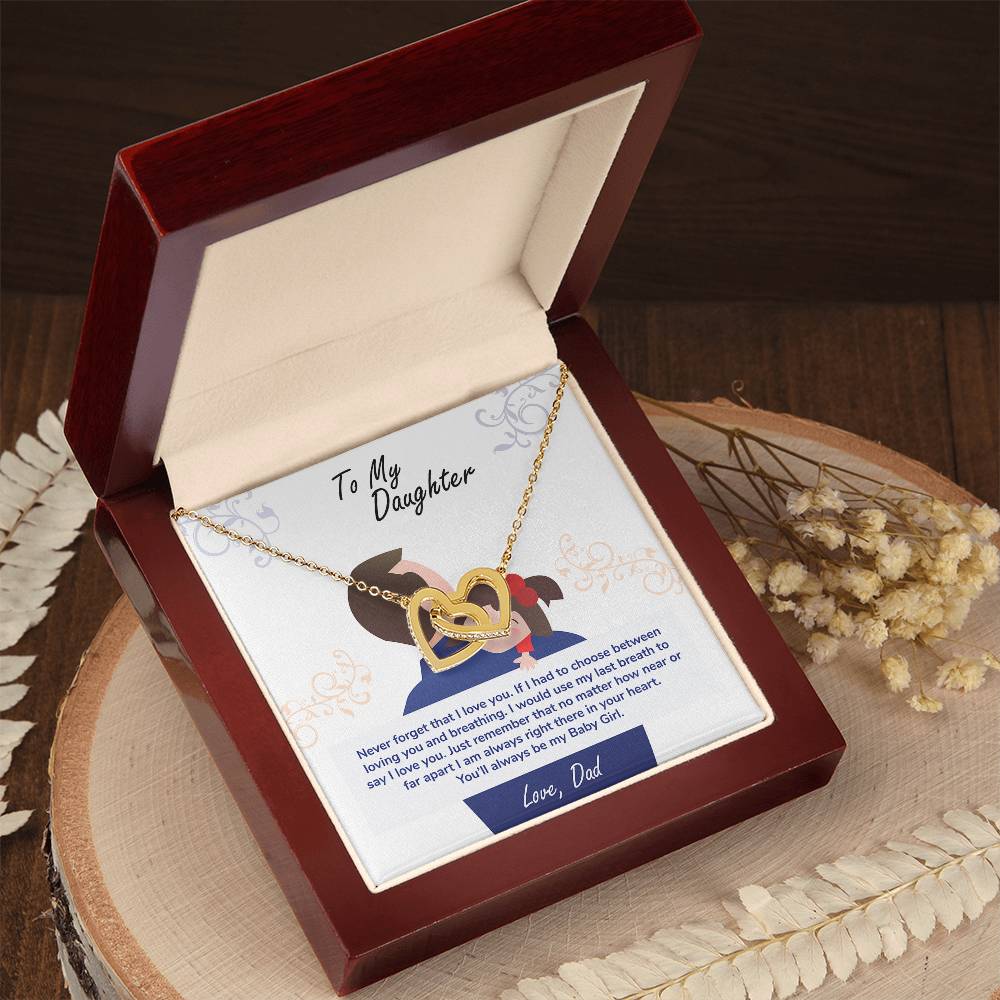 A heart-shaped pendant with an infinity symbol, adorned with cubic zirconia crystals and a loving message from a father to a daughter, presented in a wooden gift box - To My Daughter, You_ll Always Be My Baby Girl - Interlocking Hearts Necklace by ShineOn Fulfillment.