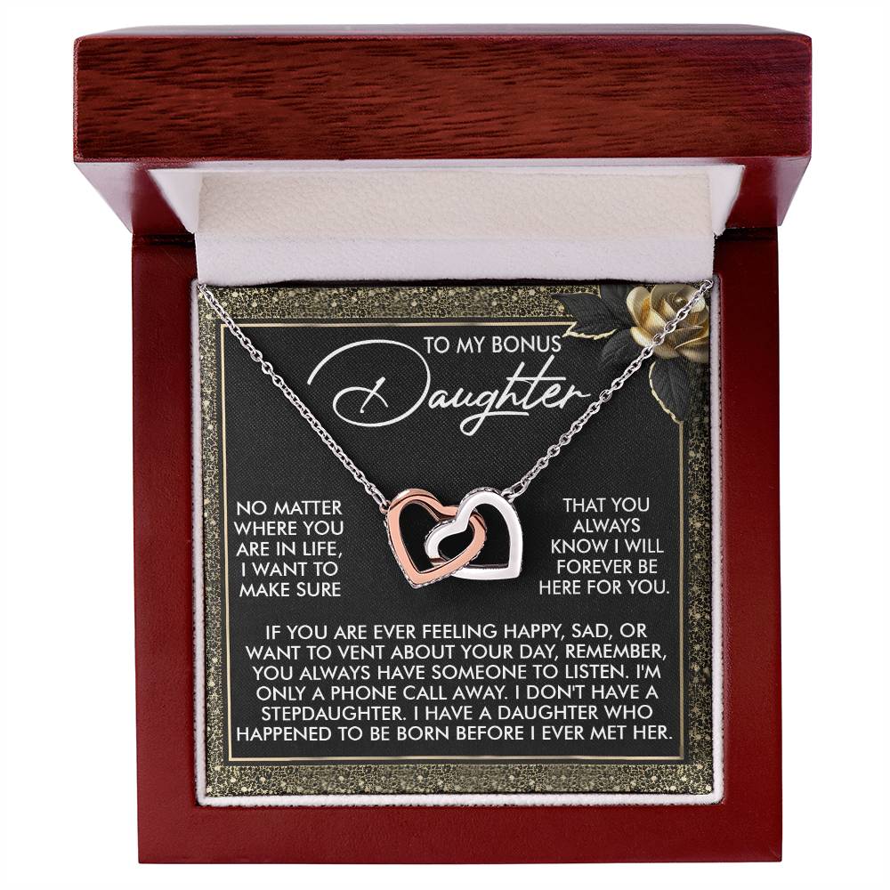 The Daughter-Phone Call - Interlocking Hearts Necklace features cubic zirconia crystals and a rose gold finish. It's presented in a lovely box with the message: "To my bonus daughter, no matter where you are in life, I want you to always know I will forever be here for you.