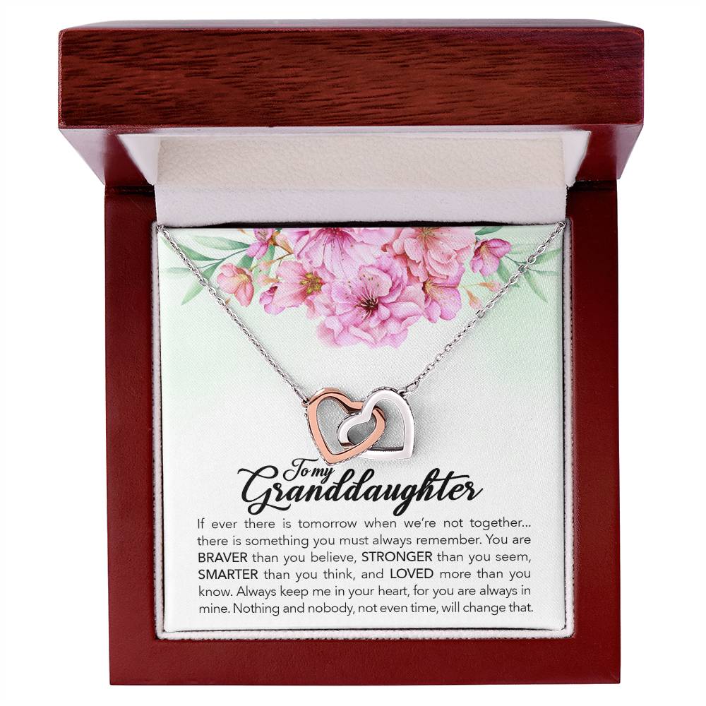 A ShineOn Fulfillment necklace featuring the "To My Granddaughter, Always Keep Me In Your Heart" pendant adorned with cubic zirconia crystals, presented in a box with a message for a granddaughter.
