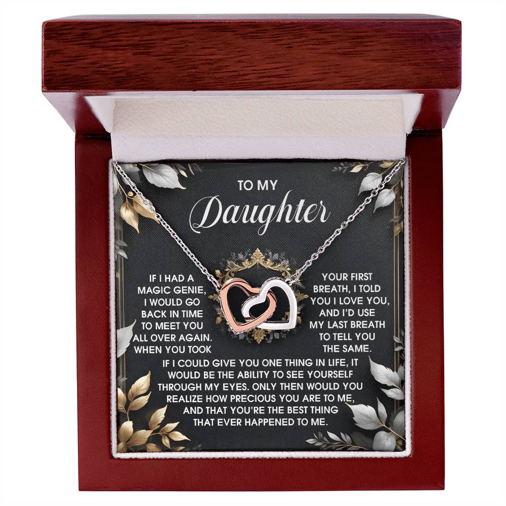 The Daughter-Over Again - Interlocking Hearts Necklace, featuring a rose gold finish and cubic zirconia crystals, is beautifully displayed in a jewelry box with a heartfelt message for a daughter in the background.