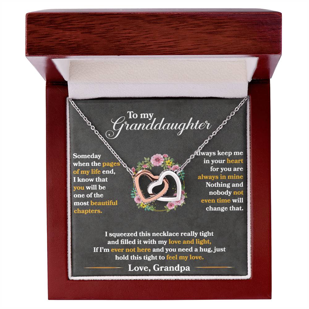 A "To My Granddaughter, Hold This Tight To Feel My Love - Interlocking Hearts Necklace" from ShineOn Fulfillment in a gift box featuring a sentimental message for a granddaughter.