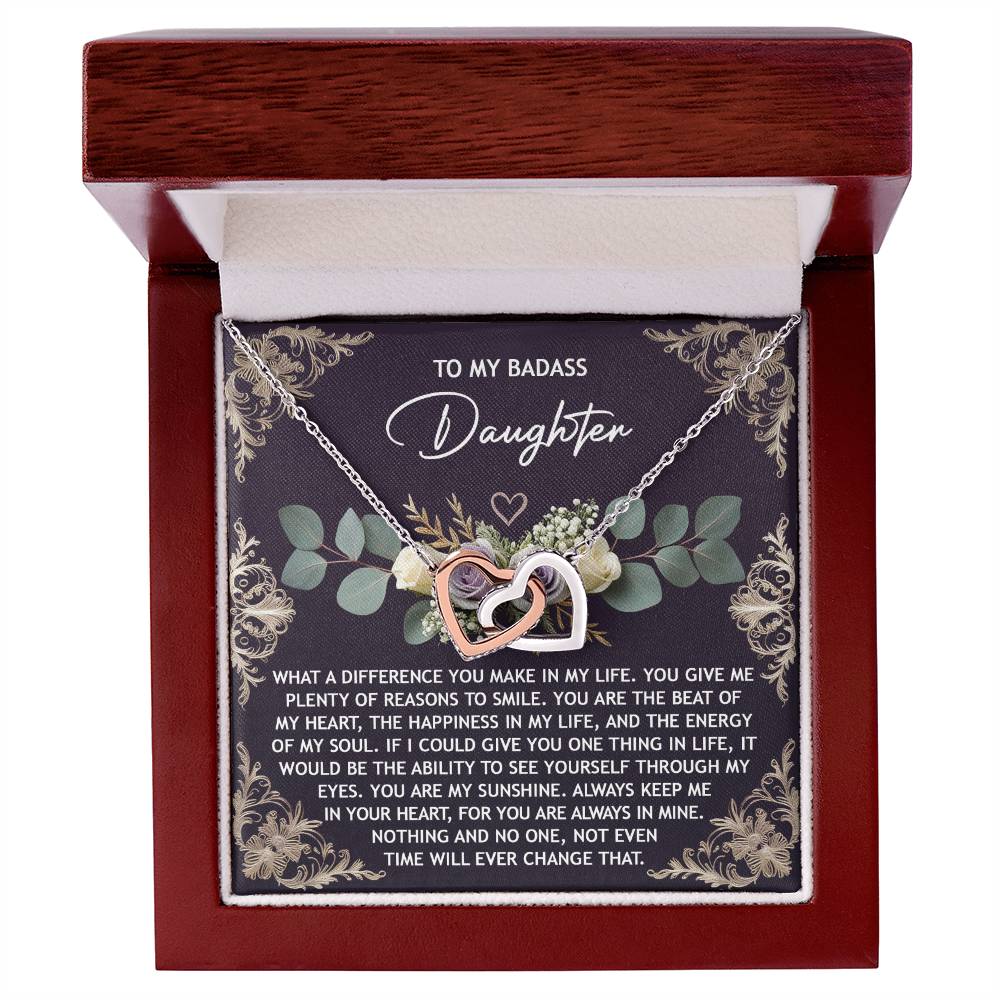 The Daughter-Always In Mine - Interlocking Hearts Necklace is adorned with sparkling cubic zirconia crystals and comes in a wooden box. Inside the lid is a heartfelt message, making it the perfect gift for your daughter.