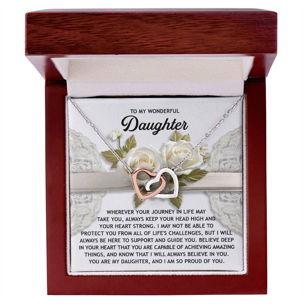 The Daughter-Your Heart - Interlocking Hearts Necklace, finished in rose gold and adorned with cubic zirconia crystals, is presented in a red box and includes a heartfelt message for your daughter.