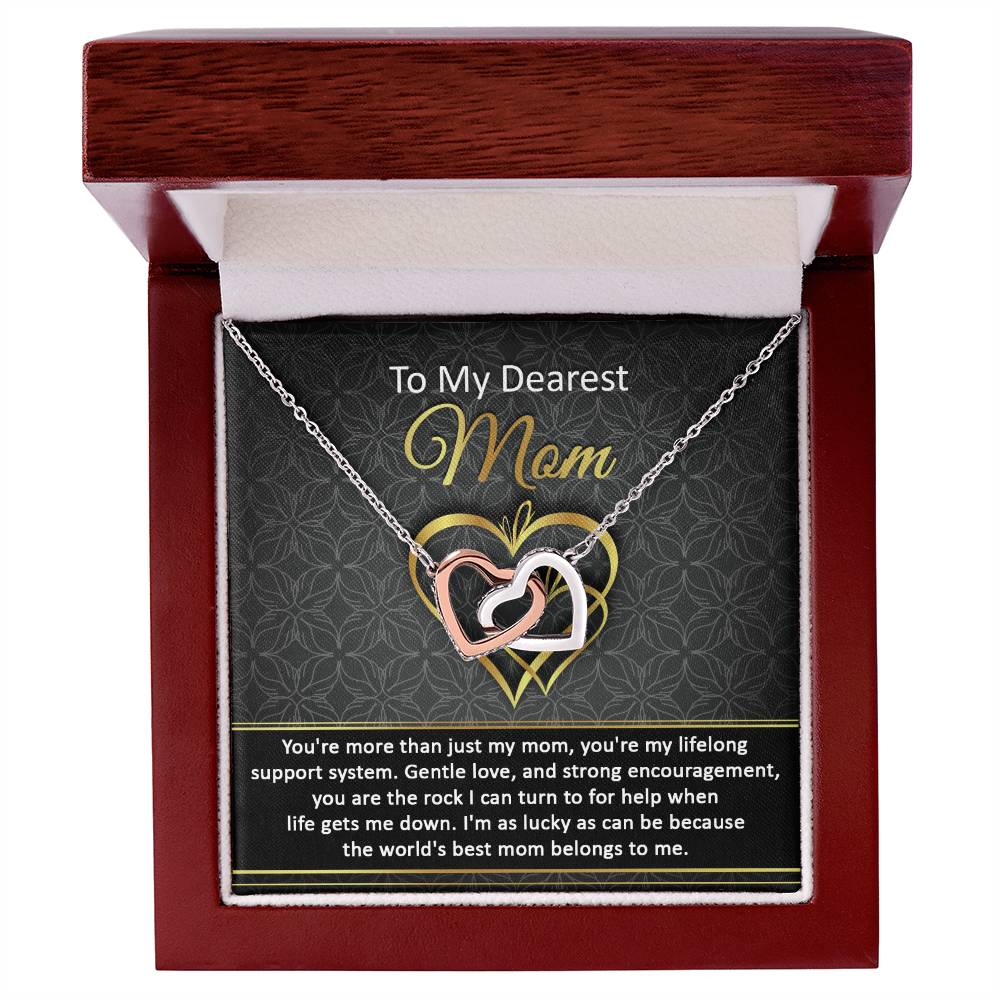 The "To Mom, Belongs To Me2 - Interlocking Hearts Necklace" features shimmering cubic zirconia crystals in a box. It includes the message, "To My Dearest Mom," expressing love and support—an ideal personalized gift to show endless appreciation and affection.