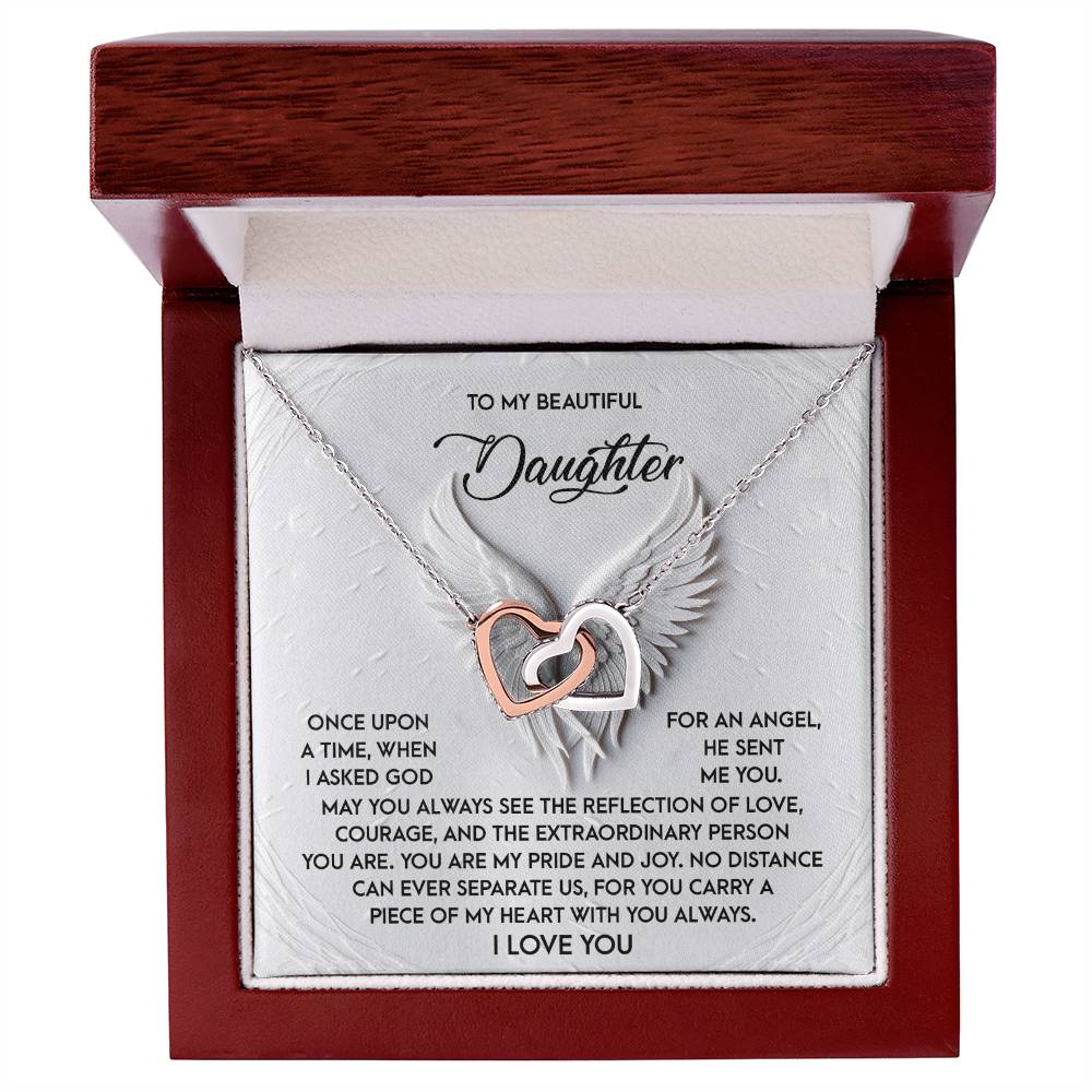 The Daughter-An Angel - Interlocking Hearts Necklace, embellished with cubic zirconia crystals and wing pendants, comes in an open wooden box with an inscription expressing love and admiration for a daughter.