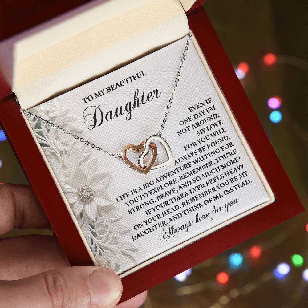 The Daughter-Think Of Me - Interlocking Hearts Necklace with rose gold finish is displayed in a box. The background card, addressed to "Beautiful Daughter," carries an inspirational message from a parent and is adorned with stunning cubic zirconia crystals for added sparkle.