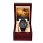 A black chronograph watch with a copper dial is elegantly displayed in an open wooden box. Inside the lid, a partially visible message featuring a lion image and text addressed to "Dad" adds a personal touch to this "To Dad, Repay Your Love - Metal Chronograph Watch".