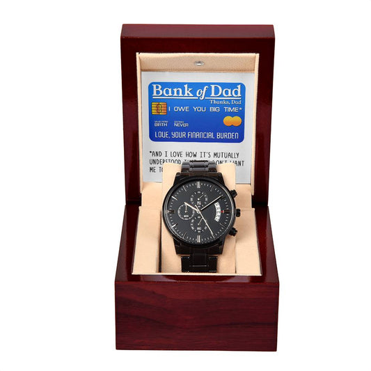 A To Dad, Bank Of Dad - Metal Chronograph Watch in an open wooden box. A card inside the box reads "Bank of Dad" and features humorous text about owing time and financial burden.