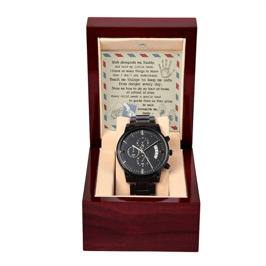 A black To Daddy, Walk Alongside Me - Metal Chronograph Watch is displayed in a wooden box with a message card. The card features a sentimental poem and is designed with an airplane and compass background.