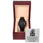 A black To Dad, Not Because - Metal Chronograph Watch displayed in an open wooden box with an engraved plate stating "Dad, You Are The King" and a lion illustration above the text. This sophisticated timepiece, featuring a luxury copper dial, includes a heartfelt message for a father.