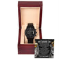 The "To Husband, By Your Side - Metal Chronograph Watch" is elegantly presented in an open wooden box with a heartfelt message inside addressed to a husband on their wedding day, complemented by images of lions in the background.
