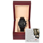 A black "Wedding, Down The Aisle - Metal Chronograph Watch" with a copper dial is displayed in an open dark wooden gift box, with a card inside the lid containing a printed message.