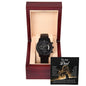 A black chronograph watch with a copper dial, encased in a wooden box with a heartfelt “To Dad, My Lion King - Metal Chronograph Watch” message inside.