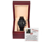 A To Groomsman, Top Secret - Metal Chronograph Watch in an open wooden box. Behind the watch, a "Top Secret" themed note with instructions for a groom's mission in a wedding is displayed.