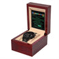 The "To Groomsman, Saving Search Data - Metal Chronograph Watch" in black with day and date display is elegantly presented in a wooden box with a beige interior. A card behind the watch reads "Groomsman, Time to Suit Up!" and provides specific instructions for the groomsman.
