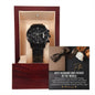 A luxury To Husband, For Each Other - Metal Chronograph Watch in an open wooden display box with a card reading "Best Husband and Father in the World," featuring an image of a bow tie and roses.
