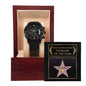 A "To Husband, Star of Fame - Metal Chronograph Watch" in black, presented in a red wooden box with a plaque behind it labeled "Hollywood Star of Fame - Husband of the Year.