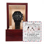 A "To Groom, I Met You - Metal Chronograph Watch" in black, presented in a wooden box with a postcard behind it. The postcard features an illustration and a heartfelt message addressing the groom on his wedding day.