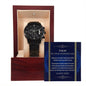 A Son Wedding-Be My Son - Metal Chronograph Watch is displayed in a wooden box with a message that reads, "To my son on your wedding day." The luxury timepiece features a white-faced dial and a sleek metal band.