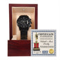 A black To Dad World's Best Daddy - Metal Chronograph watch displayed in an open wooden box with a "certificate of appreciation" titled "world's best daddy" in the lid.
