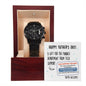 A "To Dad, Tech Support Voucher - Metal Chronograph Watch" in a wooden box with a "Happy Father's Day!" note from the Tech Department to the Finance Department.
