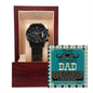 A stylish black chronograph watch, featuring a copper dial, sits elegantly in a wooden box with a sign that reads, "To Boyfriend's Dad, Father Like You - Metal Chronograph Watch.