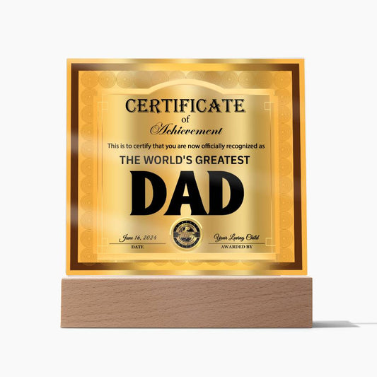 A gold-colored certificate reads "To Dad, Officially Recognized As - Acrylic Square Plaque," awarded on June 16, 2024. The unique and sentimental gift is mounted on a wooden stand with an LED wooden base that illuminates the message beautifully.
