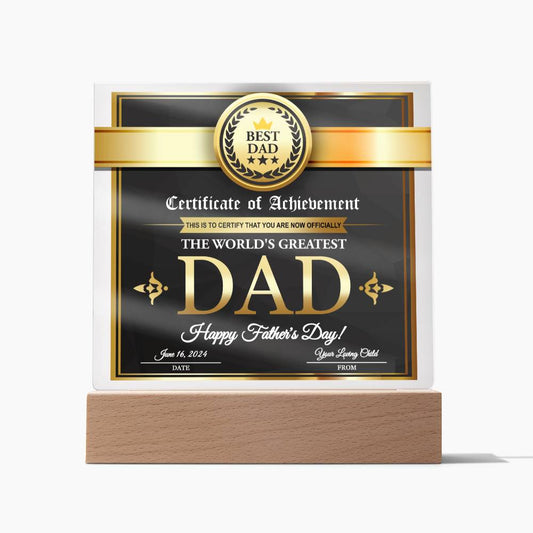 A square acrylic plaque with a wooden base has "Best Dad" at the top and reads "Certificate of Achievement, The World's Greatest Dad, Happy Father's Day!" with spaces for a date and from whom. This unique sentimental gift is perfect for honoring your dad: the **To Dad, Your Loving Child - Acrylic Square Plaque**.