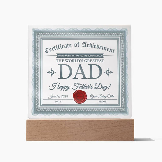 A "To Dad, Certificate Of Achievement - Acrylic Square Plaque" on a sentimental gift—a square acrylic plaque with an LED wooden base—dated June 16, 2024. It features a red seal and is signed from "Your Loving Child.