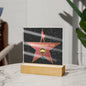 A unique gift, this acrylic plaque on a wooden base features a star design with the text "To Dad, The Legendary Dad - Acrylic Square Plaque" and an icon of a mustache in the center.