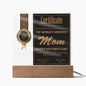 A mother's day certificate in a frame with a gold seal, labeled "world's greatest mom" on an LED wooden base, dated May 12, 2024.