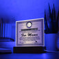A gold-themed To Fur Mama, Certificate of Achievement - Acrylic Square Plaque proclaims the recipient as the "world's most perfect fur mama." It sits on an LED wooden base.