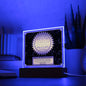 The "Seal of Excellence" acrylic plaque, titled "Best Mom In Law," features LED lighting that enhances a room and complements the plant background, making it an ideal Mother's Day gift for your mother-in-law.