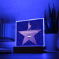 A unique gift, this acrylic plaque on a wooden base features a star design with the text "To Dad, The Legendary Dad - Acrylic Square Plaque" and an icon of a mustache in the center.