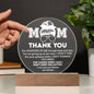 A glowing purple circular LED lamp with the inscription "mom thank you" and a heartfelt message of appreciation, displayed on the To Mom, Standing By Me - Acrylic Circle Plaque set on a wooden base.
