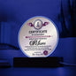 The "To Mom, World's Most Marvelous Mom" acrylic circle plaque is a high-quality award beautifully presented on a dark background, elegantly recognizing a mother's unwavering support and love.